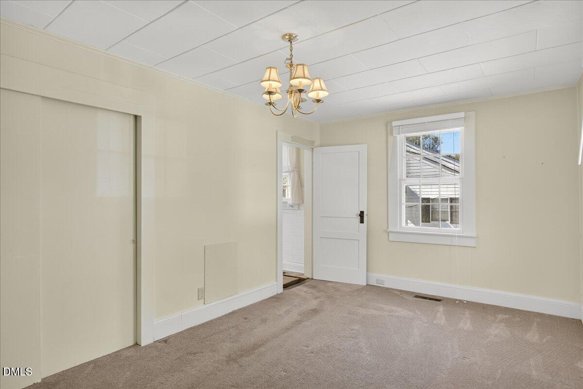 616 Roxboro Road Oxford, NC 27565 - Photo 11 of 38 a view of an empty room with a window