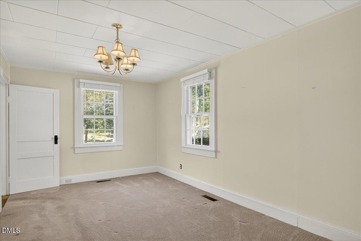 616 Roxboro Road Oxford, NC 27565 - Photo 12 of 38 an empty room with a window