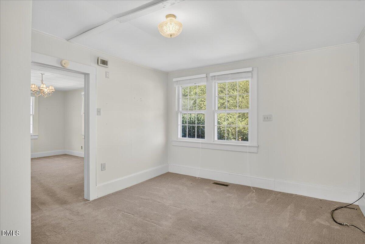 616 Roxboro Road Oxford, NC 27565 - Photo 13 of 38 a view of an empty room with a window