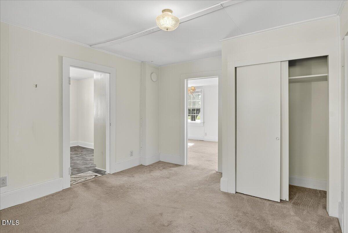 616 Roxboro Road Oxford, NC 27565 - Photo 14 of 38 an empty room with a bathroom