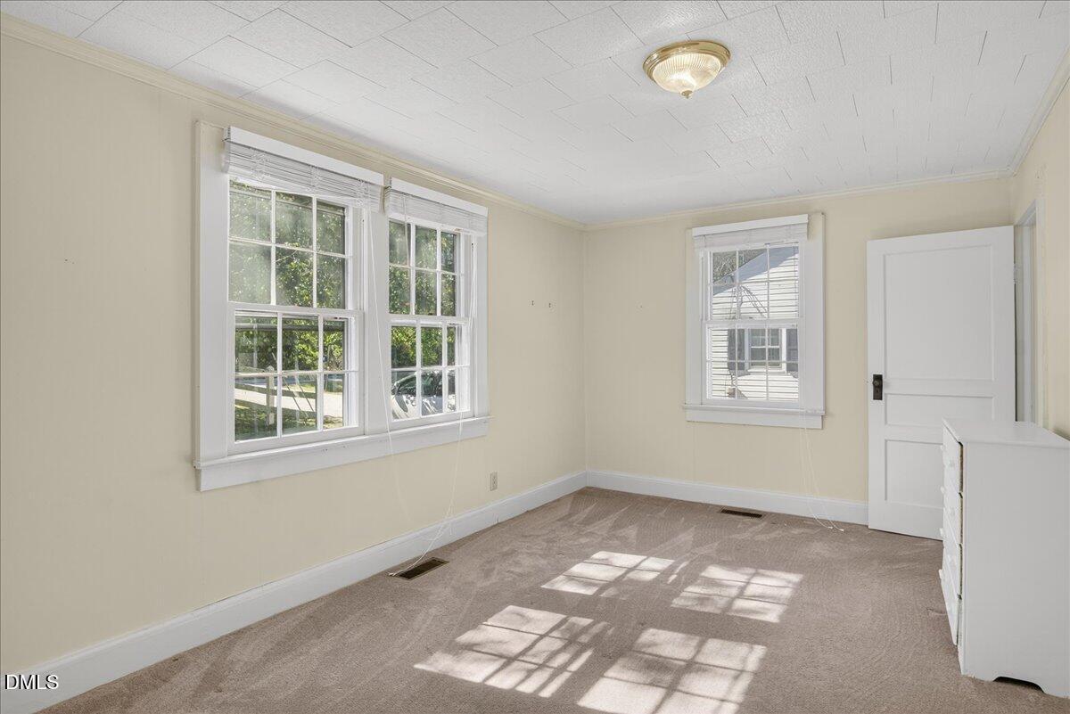 616 Roxboro Road Oxford, NC 27565 - Photo 15 of 38 a view of an empty room with a window