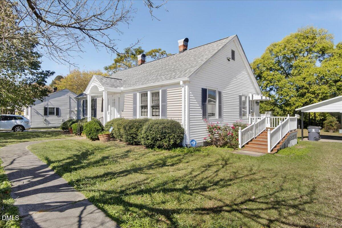 616 Roxboro Road Oxford, NC 27565 - Photo 34 of 38 a view of a house with backyard and sitting area
