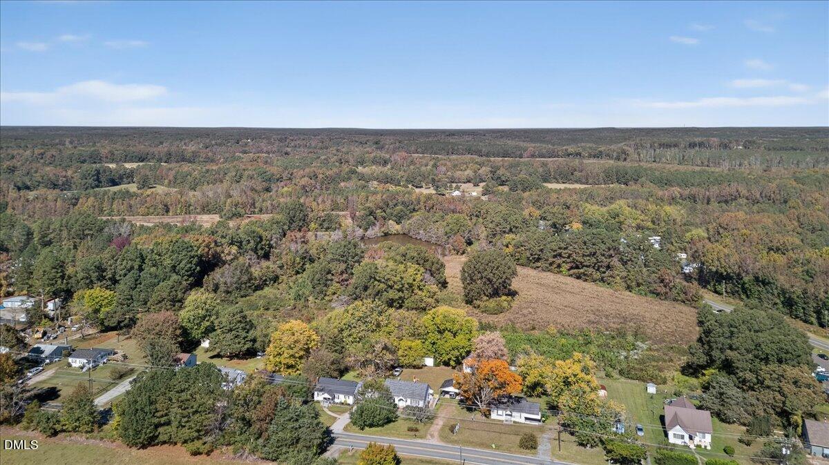 616 Roxboro Road Oxford, NC 27565 - Photo 36 of 38 an aerial view of house with yard and mountain view in back