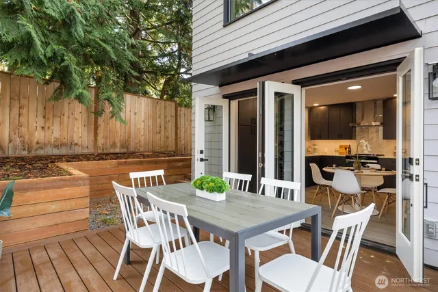 a large kitchen with cabinets a sink and appliances