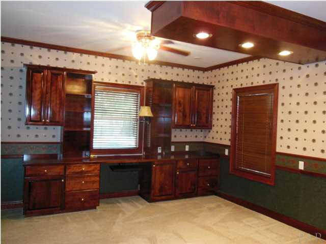 1621 West 9 & Half Mile Road Cantonment, FL 32533 - Photo 15 of 25 At the back of the house is an additional bedroom or another office space, craft room, mother-in-law suite.