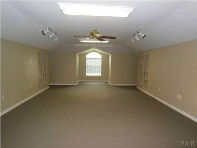 1621 West 9 & Half Mile Road Cantonment, FL 32533 - Photo 21 of 25 Bonus room above 3 car garage is very spacious
