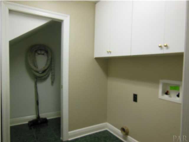 1621 West 9 & Half Mile Road Cantonment, FL 32533 - Photo 23 of 25 The laundry room with additional storage space