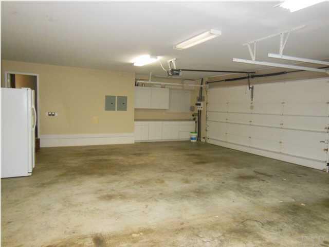 1621 West 9 & Half Mile Road Cantonment, FL 32533 - Photo 24 of 25 The full 3 car garage also has a work bench area