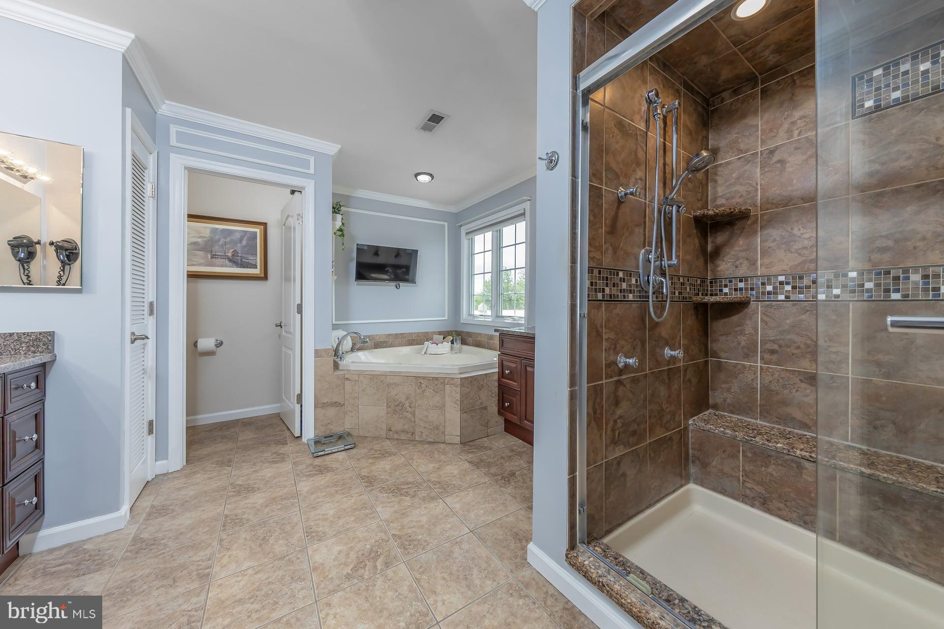 144 Point Airy Road Pilesgrove, NJ 08098 - Photo 25 of 65 a bathroom with a tub and shower