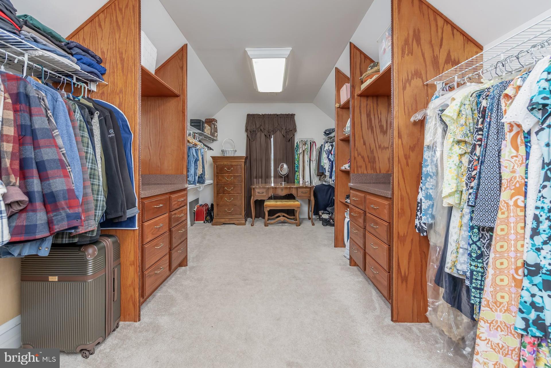 144 Point Airy Road Pilesgrove, NJ 08098 - Photo 27 of 65 a view of walk in closet with clothes and shoes