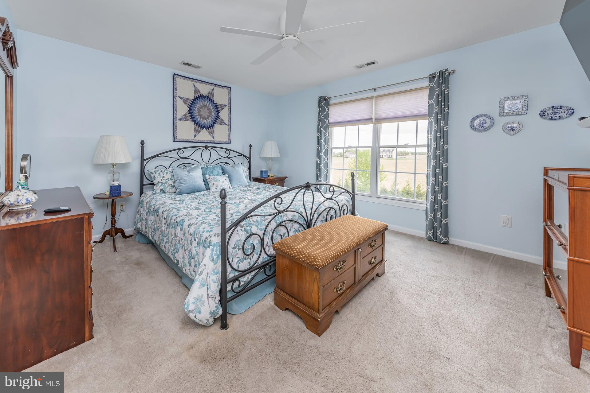144 Point Airy Road Pilesgrove, NJ 08098 - Photo 31 of 65 a bedroom with a bed couch and a window