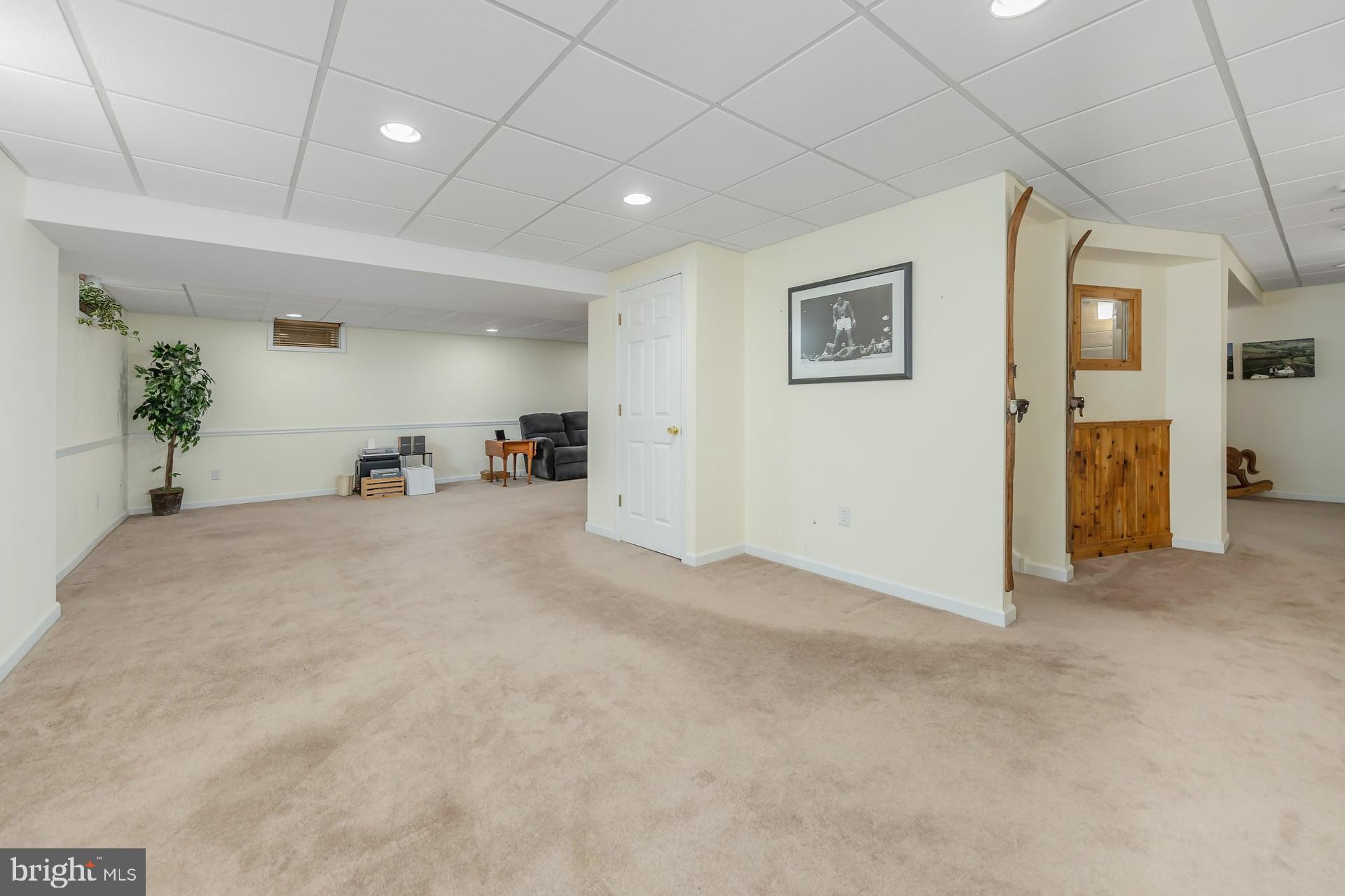 144 Point Airy Road Pilesgrove, NJ 08098 - Photo 34 of 65 a view of a livingroom with furniture and a hallway