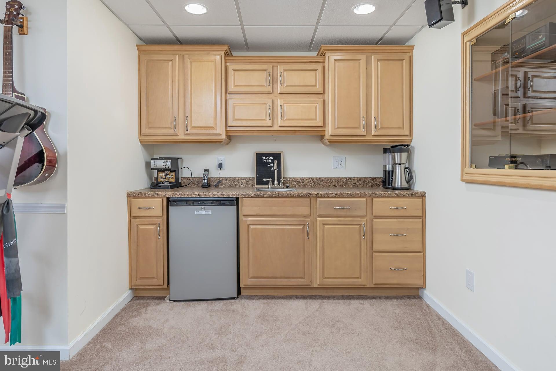 144 Point Airy Road Pilesgrove, NJ 08098 - Photo 38 of 65 a kitchen with white cabinets and white appliances