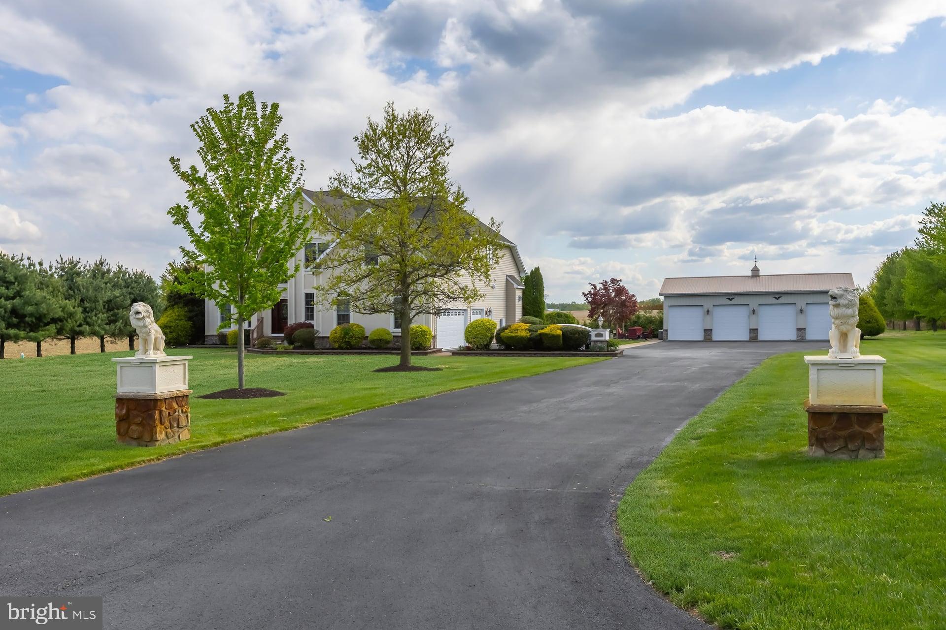 144 Point Airy Road Pilesgrove, NJ 08098 - Photo 4 of 65 a view of a house with a big yard and a large tree