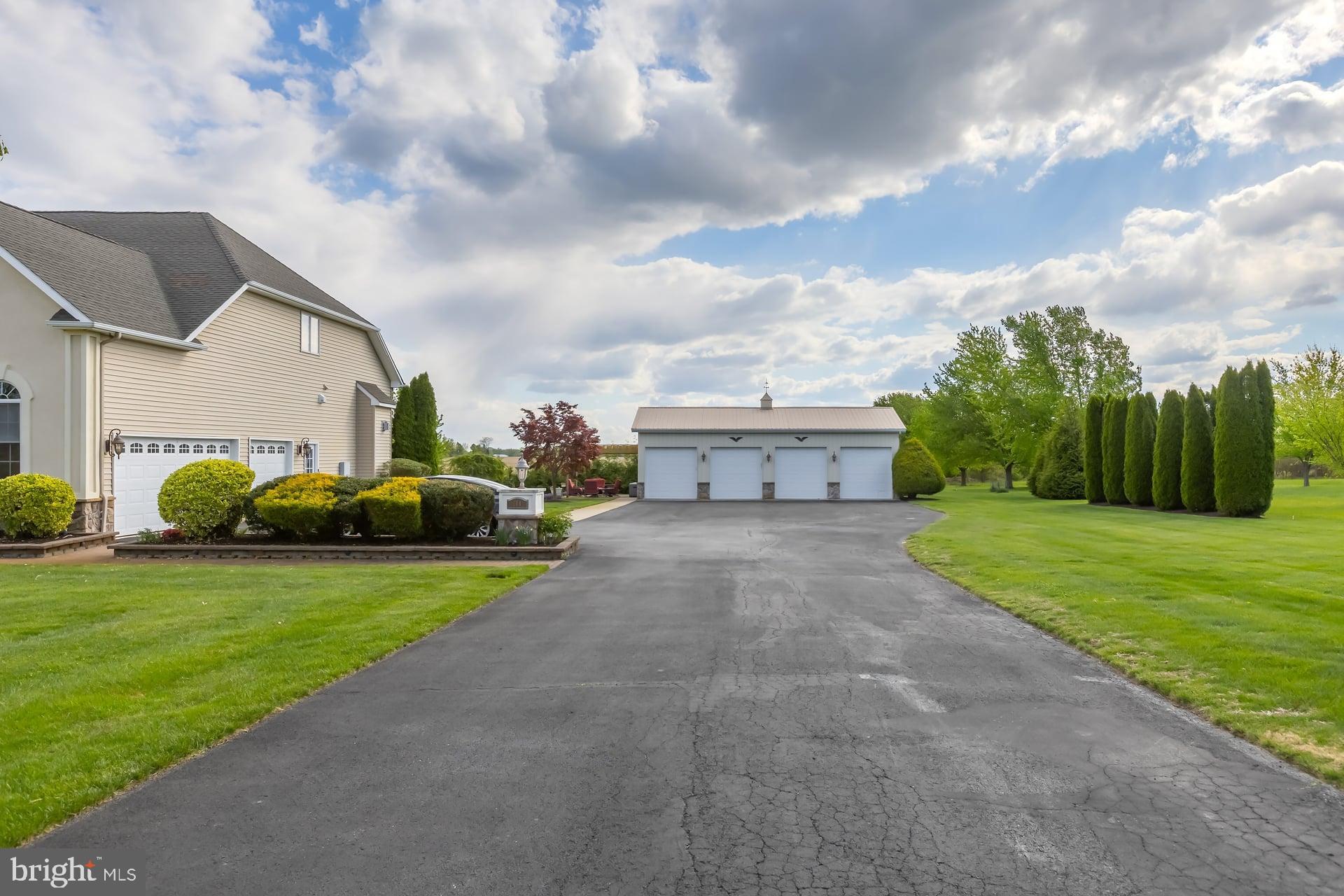 144 Point Airy Road Pilesgrove, NJ 08098 - Photo 42 of 65 a view of a house with a yard