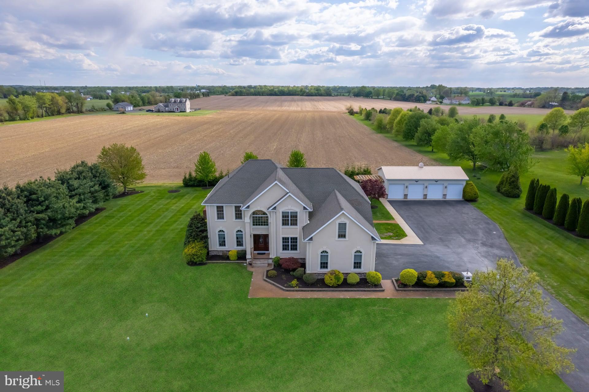 144 Point Airy Road Pilesgrove, NJ 08098 - Photo 59 of 65 a aerial view of a house with swimming pool and a yard