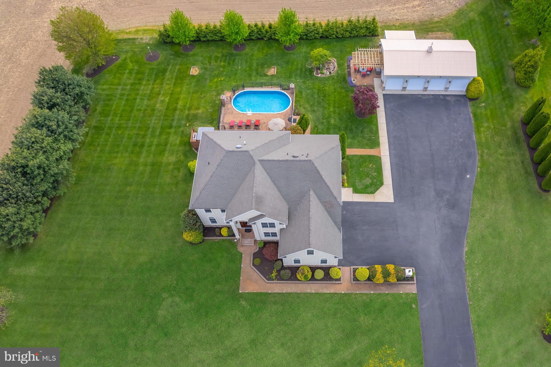 144 Point Airy Road Pilesgrove, NJ 08098 - Photo 60 of 65 an aerial view of a house with outdoor space pool seating area and yard