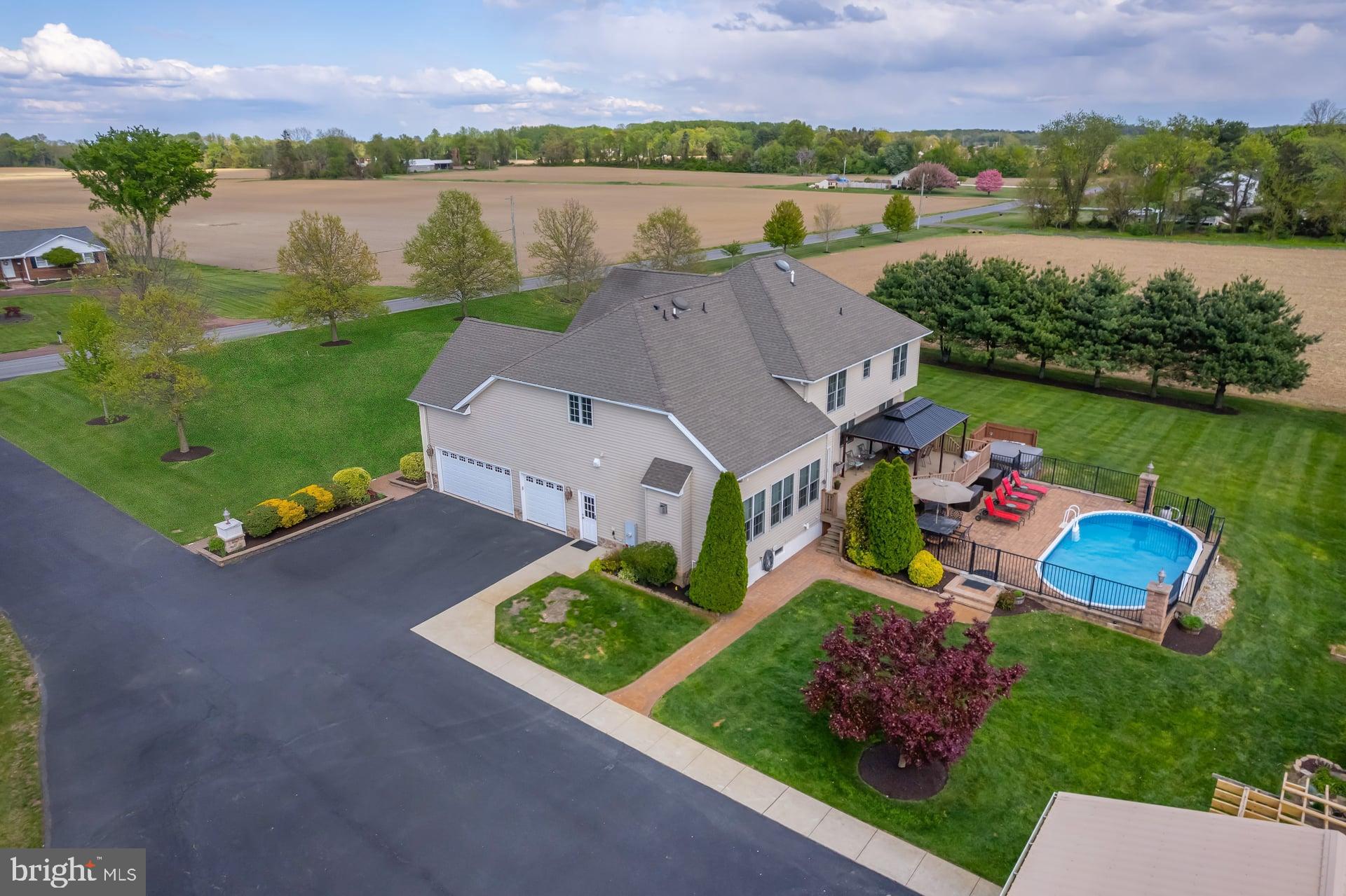 144 Point Airy Road Pilesgrove, NJ 08098 - Photo 63 of 65 an aerial view of a house with outdoor space and lake view in back