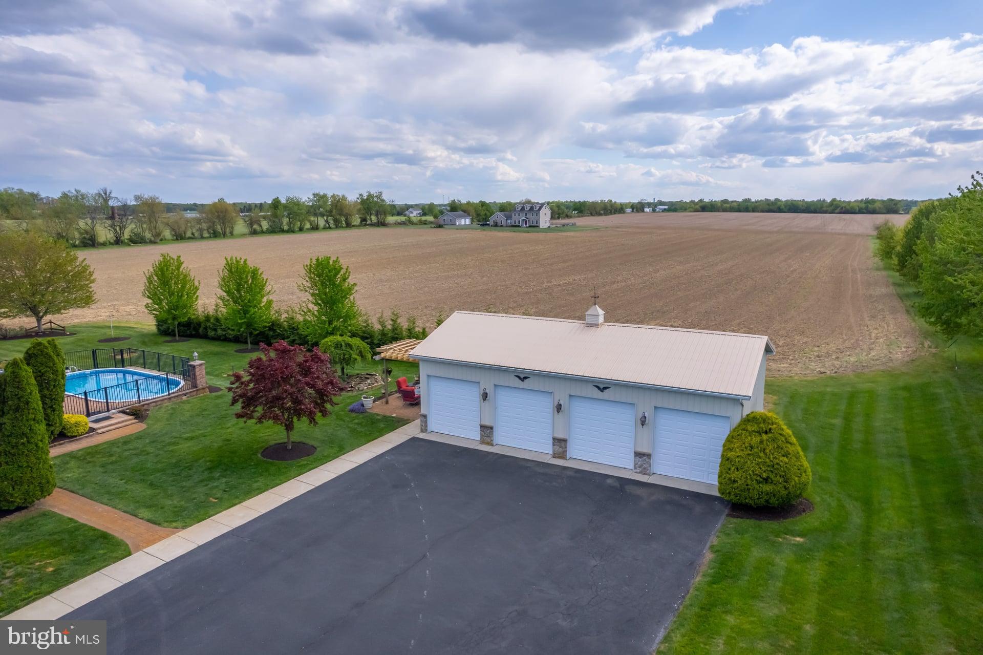 144 Point Airy Road Pilesgrove, NJ 08098 - Photo 64 of 65 a aerial view of a house with a garden and lake view