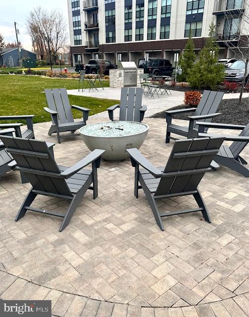 21791 Express Terrace Ashburn, VA 20147 - Photo 5 of 7 a view of a patio with swimming pool table and chairs