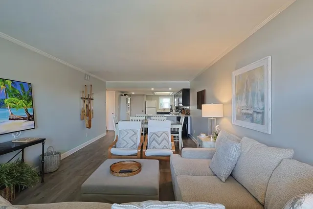 a bedroom with a bed and a night stand