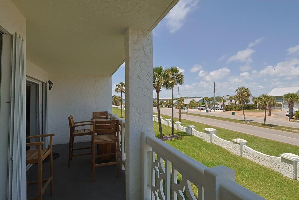 909 Santa Rosa Boulevard, Unit 528 Fort Walton Beach, FL 32548 - Photo 22 of 66 a view of a balcony with chairs
