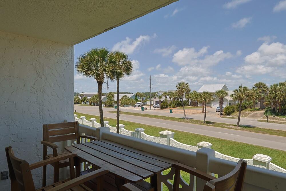 909 Santa Rosa Boulevard, Unit 528 Fort Walton Beach, FL 32548 - Photo 23 of 66 a view of a swimming pool with a lounge chair
