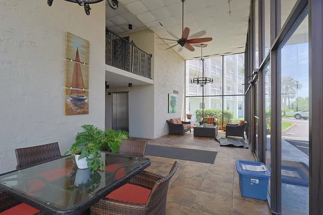 a view of a building with a yard