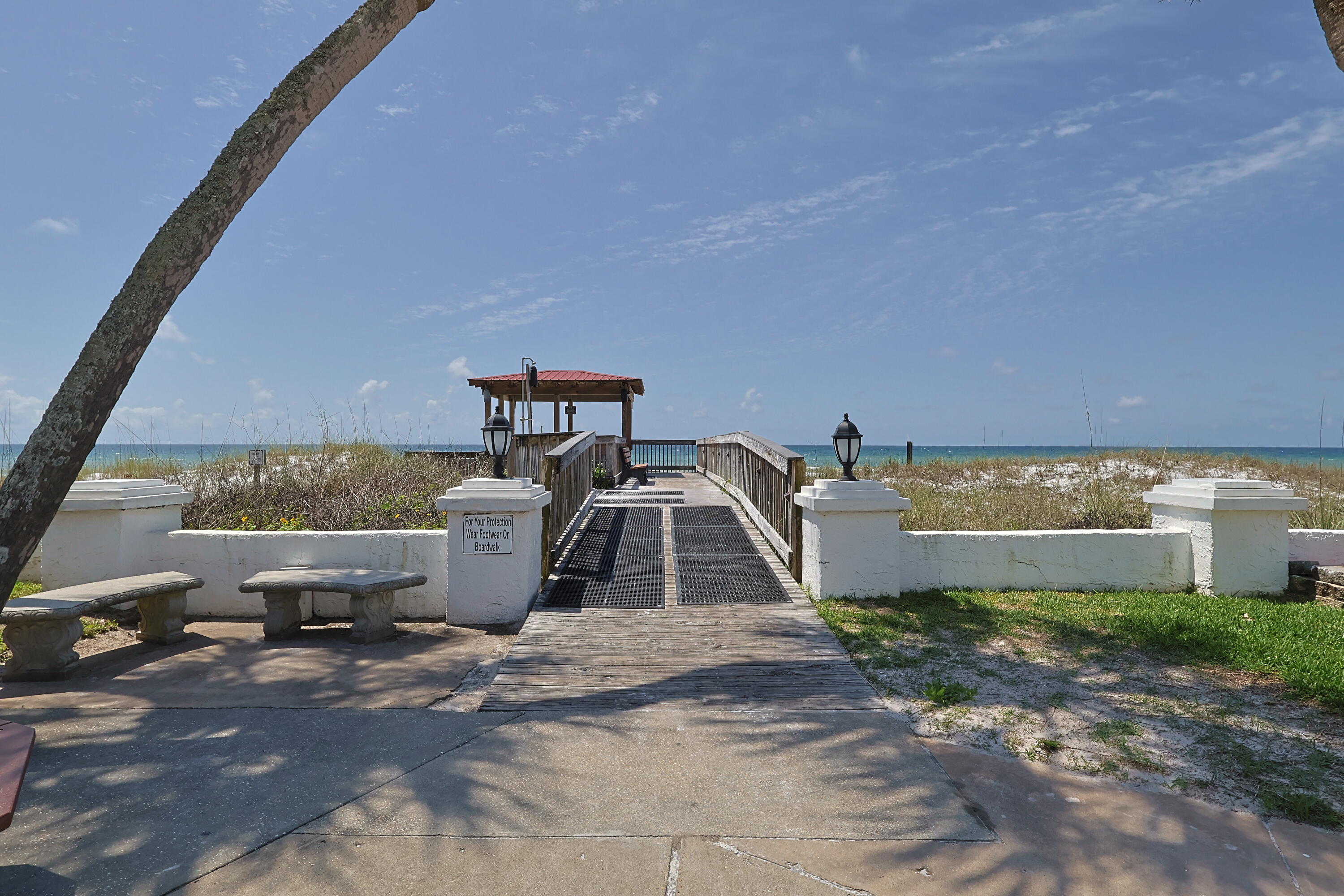 909 Santa Rosa Boulevard, Unit 528 Fort Walton Beach, FL 32548 - Photo 32 of 66 a front view of a house with a garden