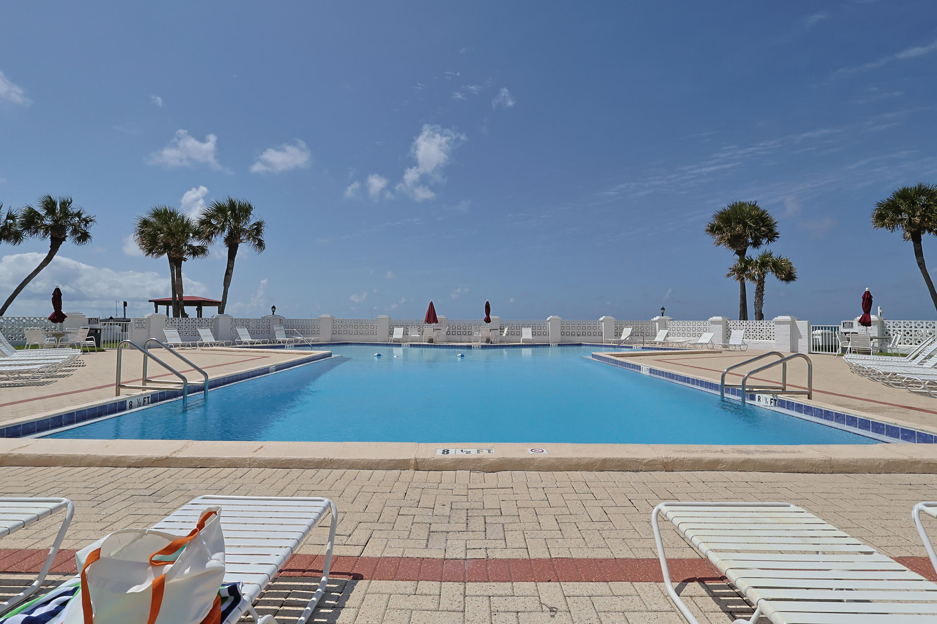909 Santa Rosa Boulevard, Unit 528 Fort Walton Beach, FL 32548 - Photo 45 of 66 a view of a swimming pool and outdoor space