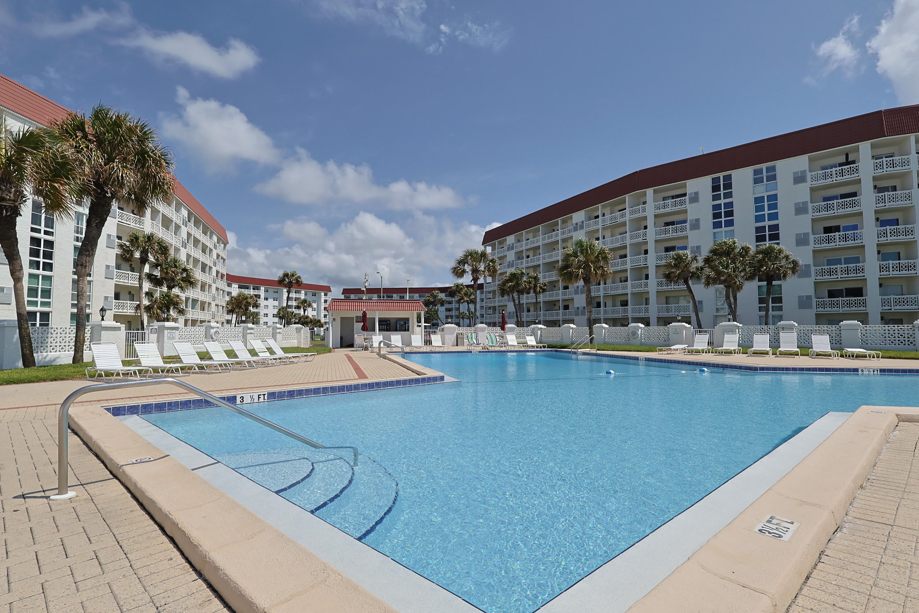 909 Santa Rosa Boulevard, Unit 528 Fort Walton Beach, FL 32548 - Photo 46 of 66 a view of a swimming pool kitchen from a balcony
