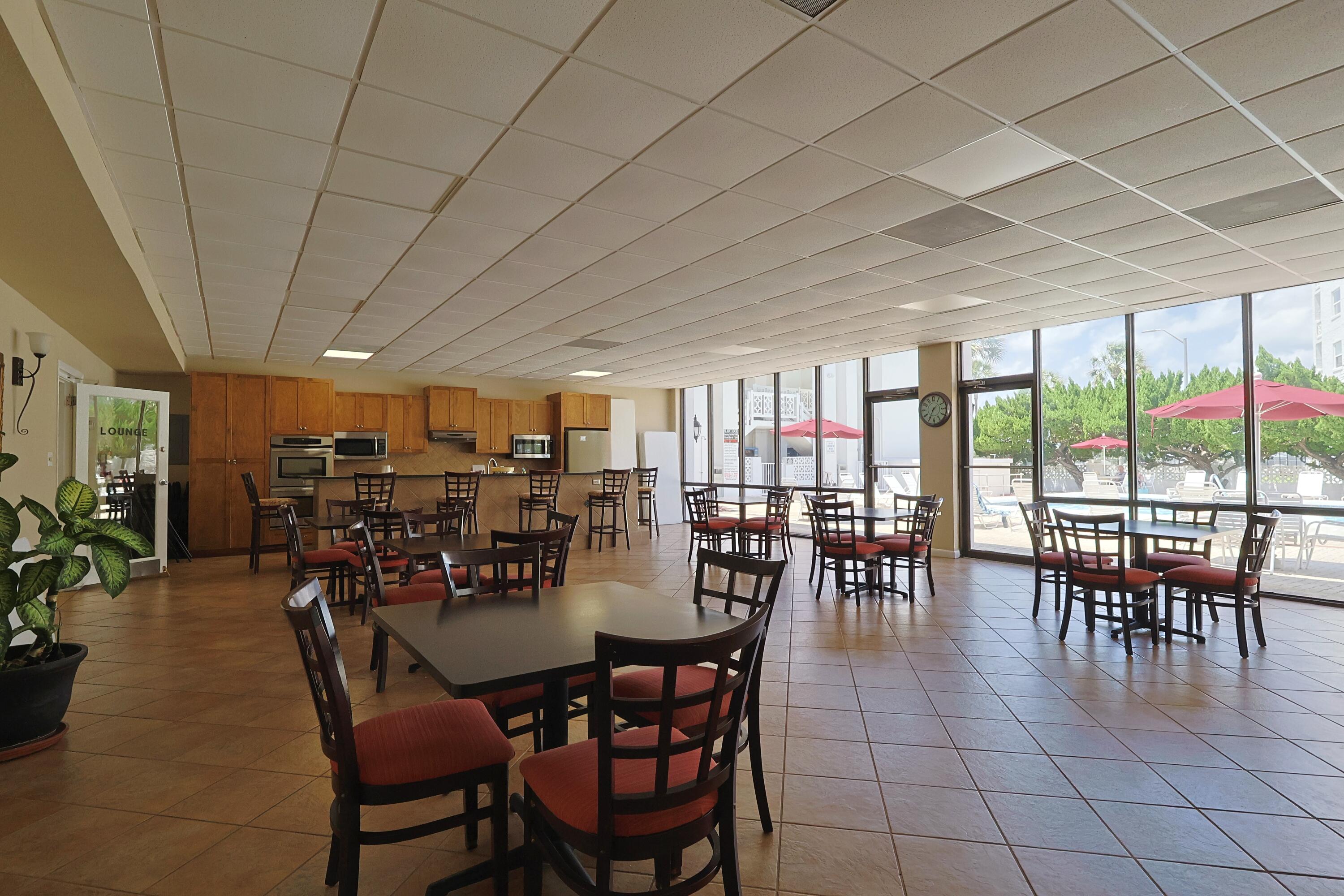 909 Santa Rosa Boulevard, Unit 528 Fort Walton Beach, FL 32548 - Photo 60 of 66 a view of a dining room with furniture window and outside view