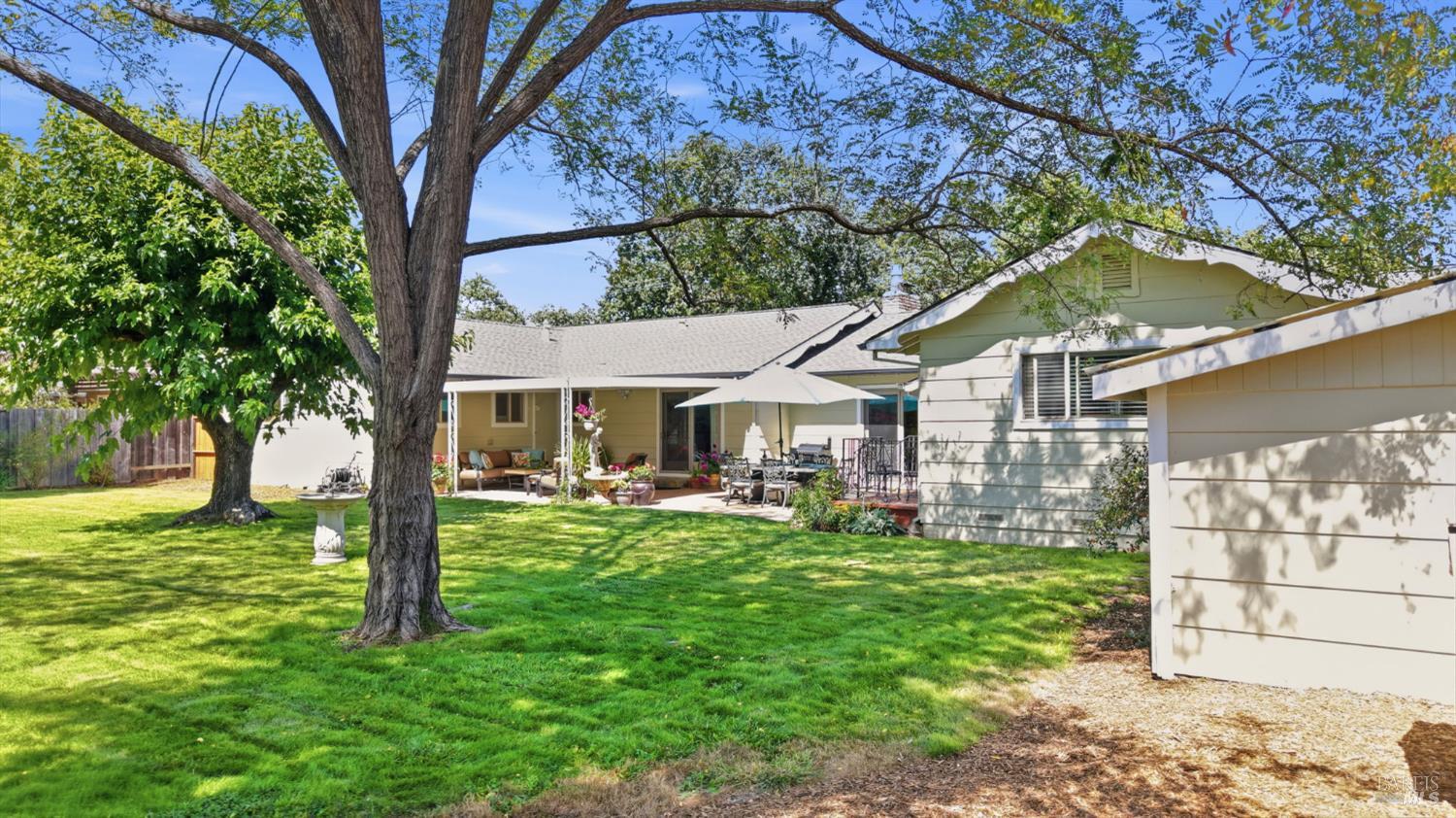 373 Piezzi Road Santa Rosa, CA 95401 - Photo 45 of 55 a view of a house with backyard porch and sitting area