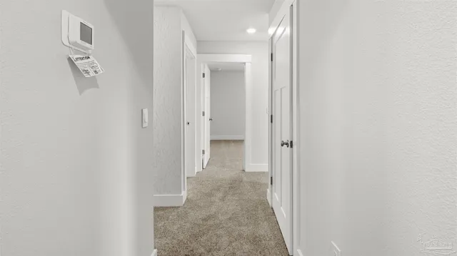 a view of a hallway with elevator