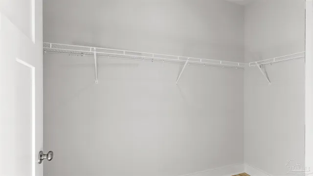 a view of a room with racks on the wall