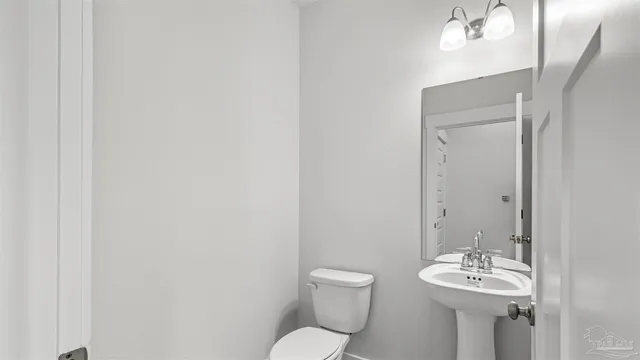a bathroom with a sink and a toilet