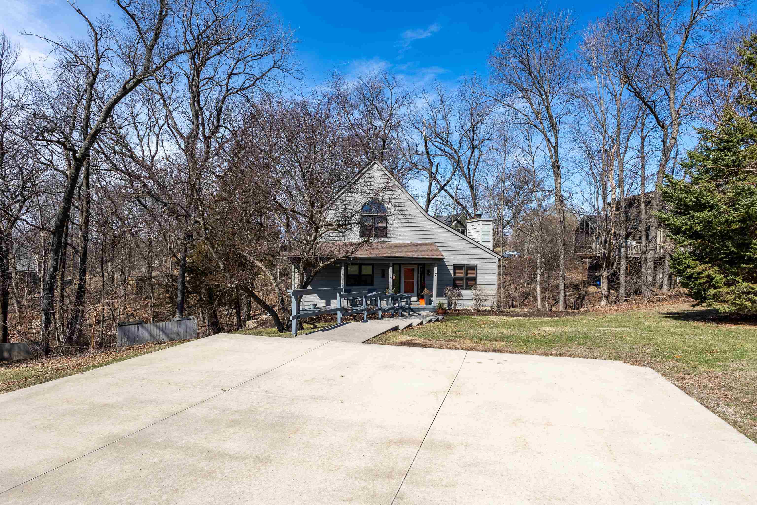 7 Colony Lane Galena, IL 61036 - Photo 2 of 36 a view of a house with a yard covered with snow