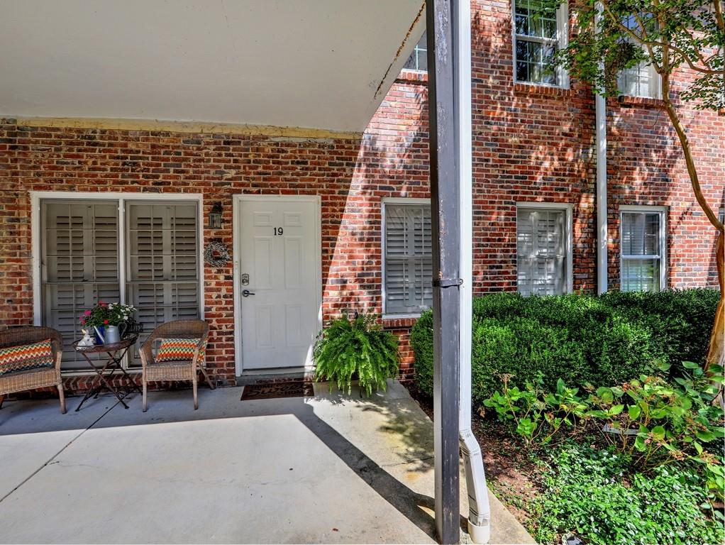 3675 Peachtree Road Northeast, Unit 19 Atlanta, GA 30319 - Photo 1 of 1 front view of a house with a porch