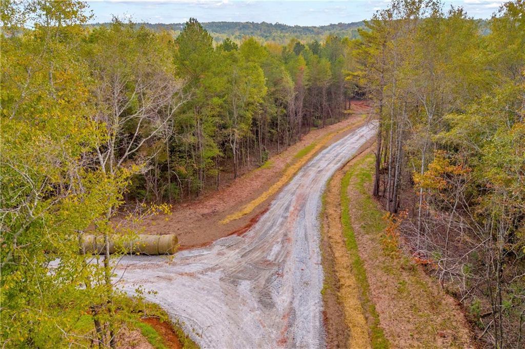 O O Curry Farms Road Jefferson, GA 30549 - Photo 24 of 35 a view of a swimming pool with a lake