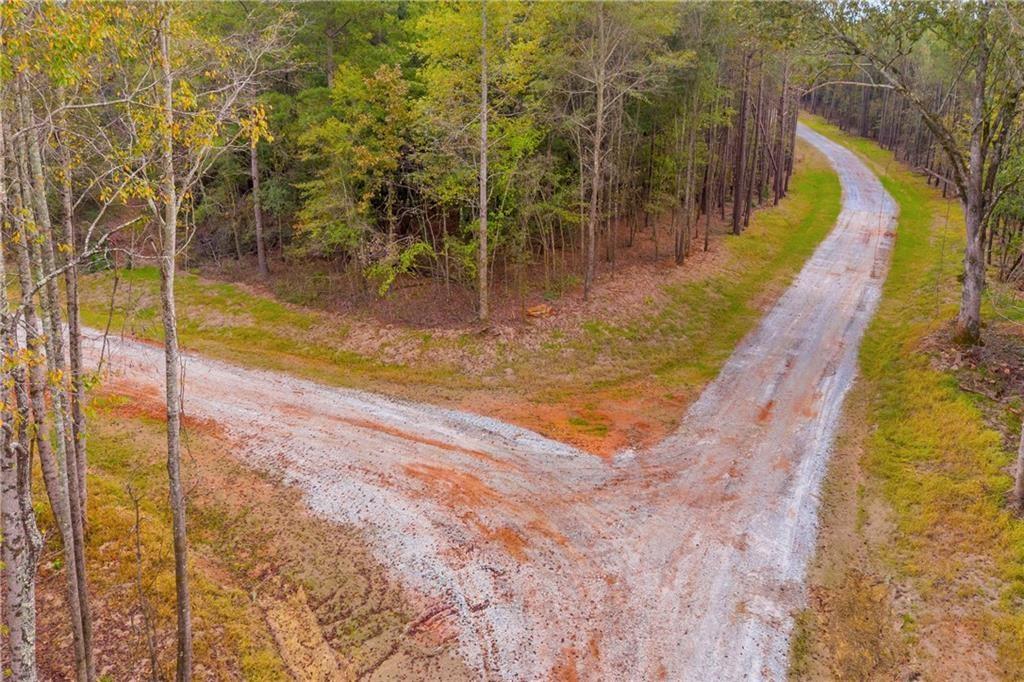 O O Curry Farms Road Jefferson, GA 30549 - Photo 25 of 35 a view of a swimming pool with a yard