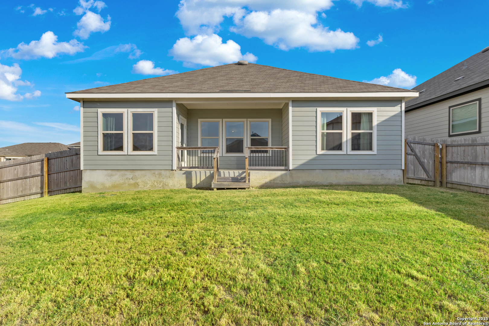 6847 Alaskan Wy. Converse, TX 78109 - Photo 26 of 32 front view of a house with a yard