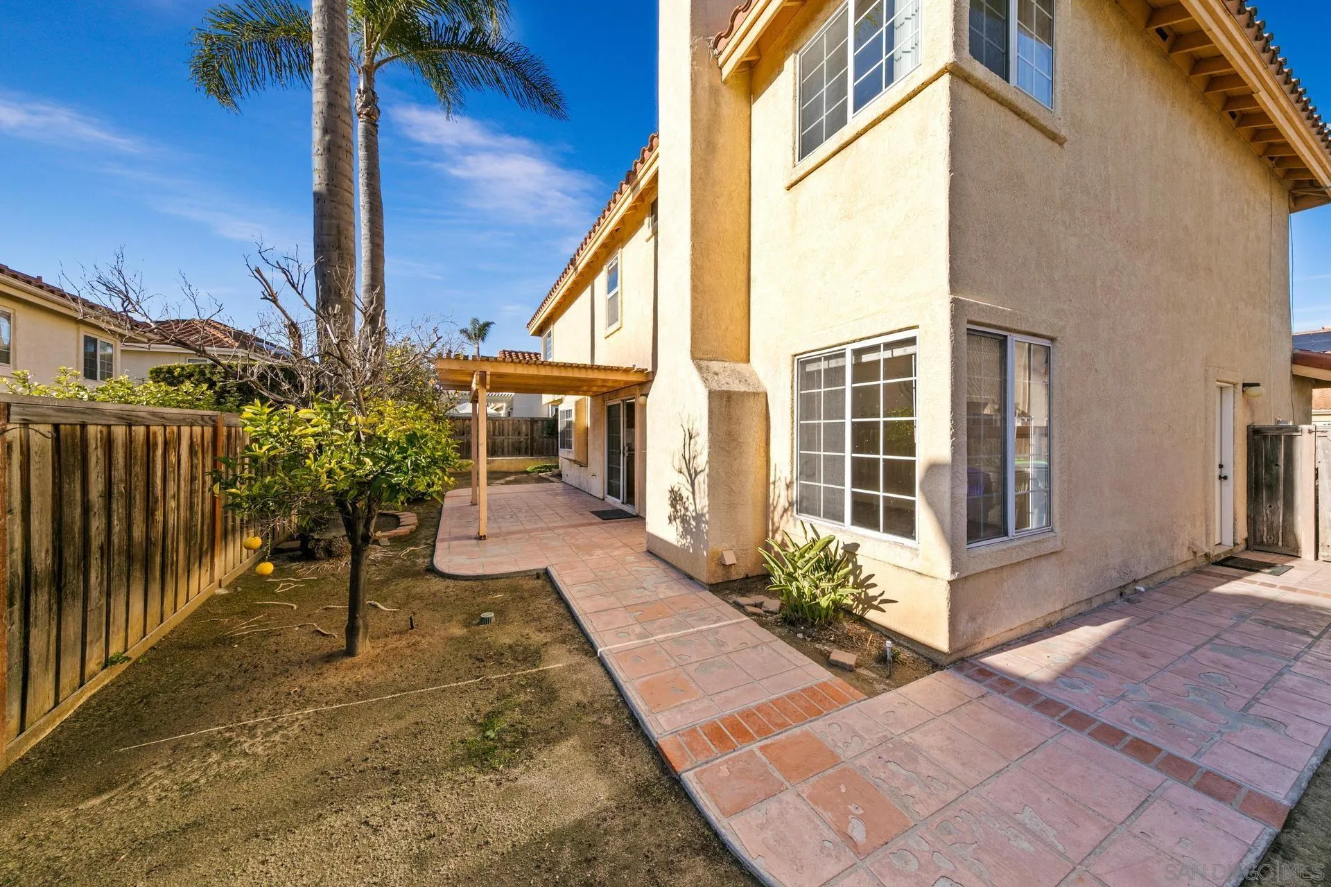 403 Calle Corazon Oceanside, CA 92057 - Photo 37 of 40 a front view of a house with a yard