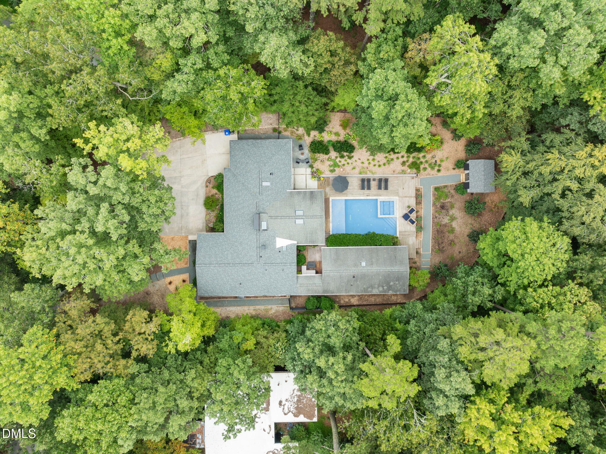 1812 Rolling Road Chapel Hill, NC 27514 - Photo 60 of 72 an aerial view of residential house with outdoor space and trees all around
