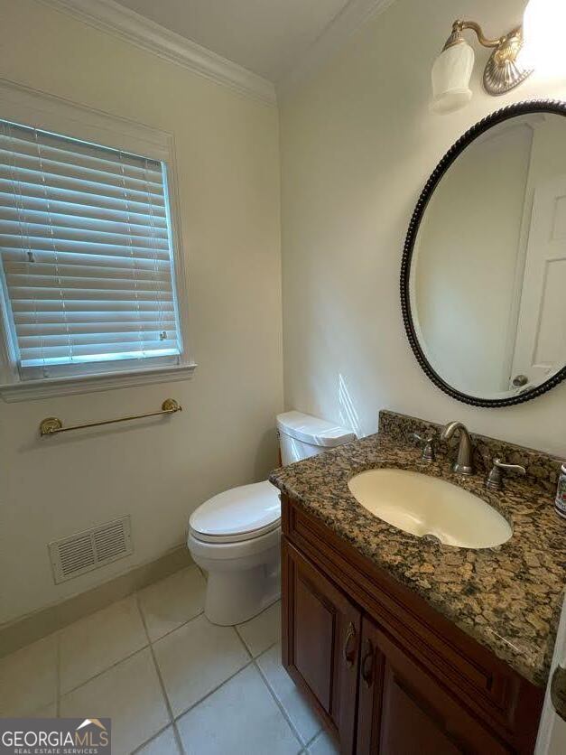 1502 Eryn Circle Suwanee, GA 30024 - Photo 13 of 57 a bathroom with a granite countertop toilet a sink and a mirror