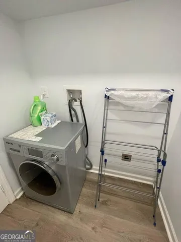 a view of a patio with a table and chairs