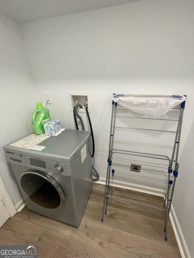 1502 Eryn Circle Suwanee, GA 30024 - Photo 43 of 57 a utility room with dryer and washer