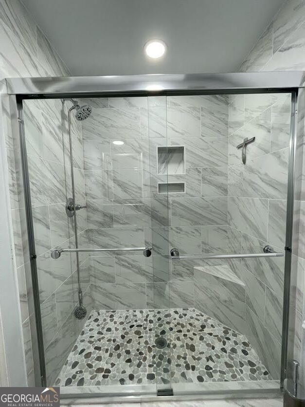 1502 Eryn Circle Suwanee, GA 30024 - Photo 47 of 57 a bathroom with a shower