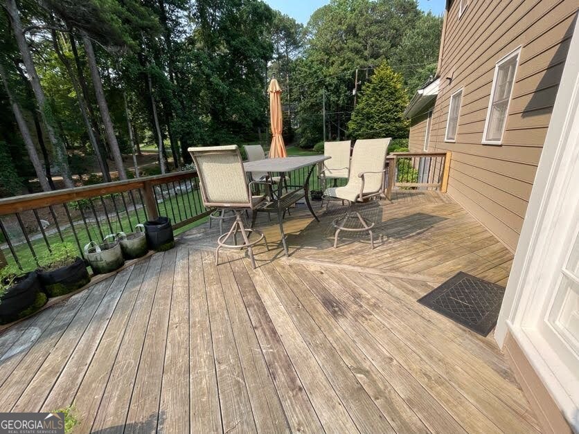 1502 Eryn Circle Suwanee, GA 30024 - Photo 49 of 57 a view of a patio with a table and chairs