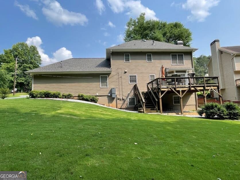 1502 Eryn Circle Suwanee, GA 30024 - Photo 57 of 57 a front view of a house with garden