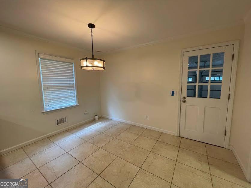1502 Eryn Circle Suwanee, GA 30024 - Photo 8 of 57 a view of an empty room with a window